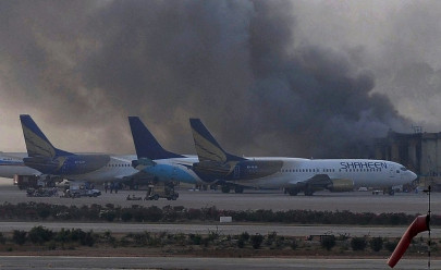 karachi airport attack fallen fighters laid to rest