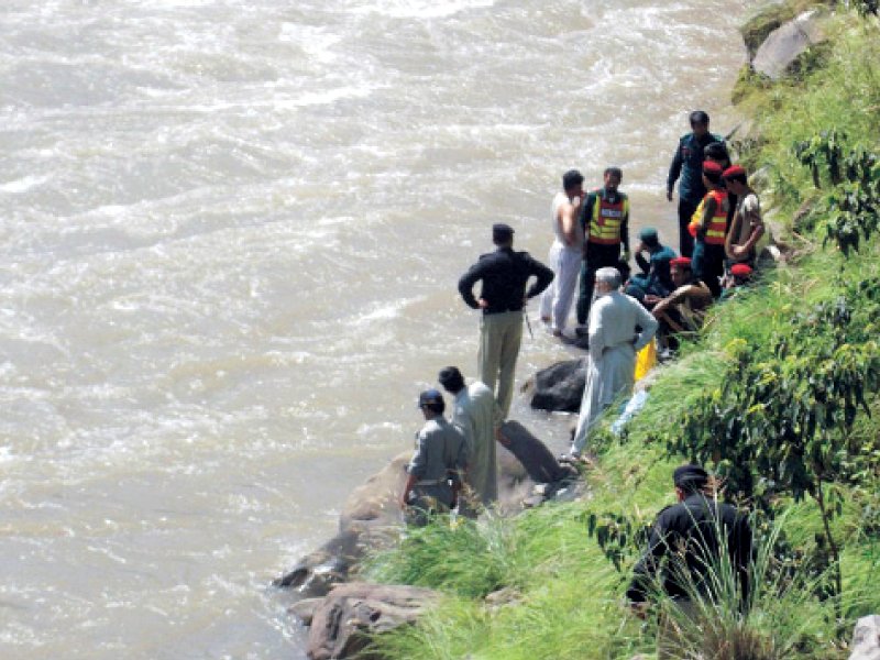 rescue 1122 personnel search for the jeep passengers in the jhelum river photo ani