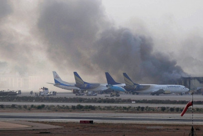 carnage at karachi airport red alert declared at lahore airport