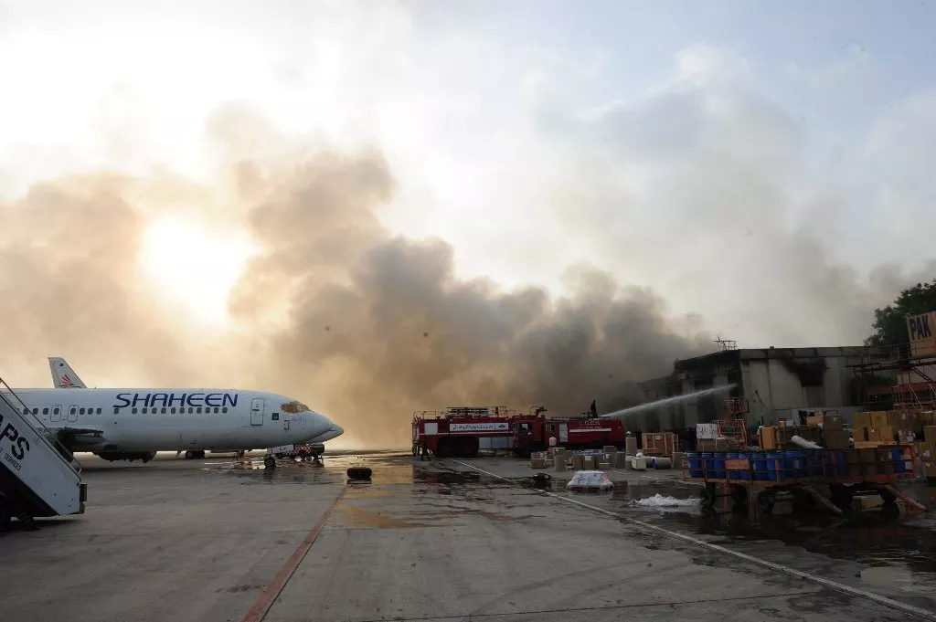 smoke rises after militants launched an assault at jinnah international airport in karachi photo afp smoke rises after militants launched an assault at jinnah international airport in karachi photo afp