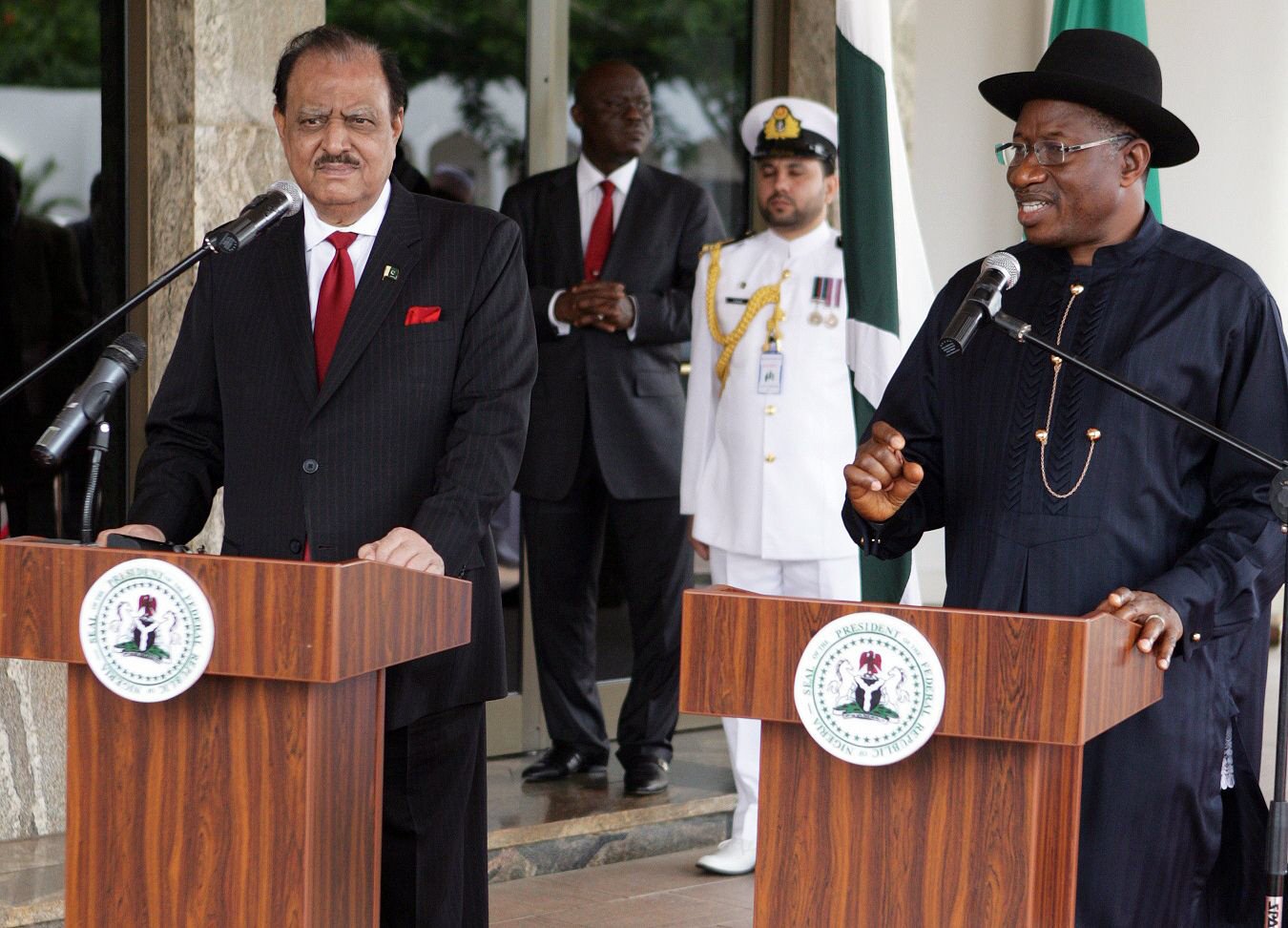 nigerian president goodluck jonathan r speaks alongside pakistani president mamnoon hussain l during a joint press conference in abuja nigeria on june 10 2014 photo afp