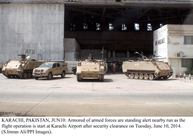 armoured vehicles stand guard at karachi airport photo ppi armoured vehicles stand guard at karachi airport photo ppi