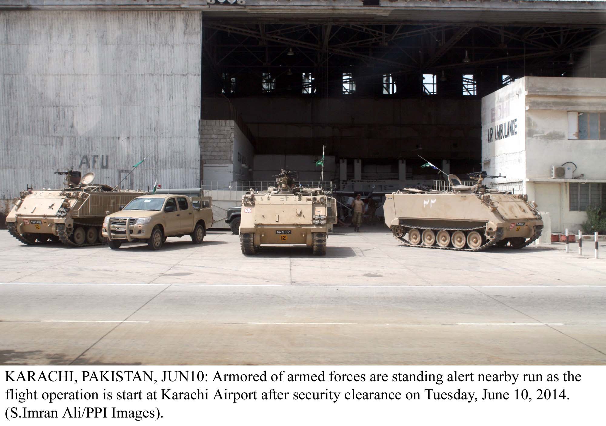 armoured vehicles stand guard at karachi airport photo ppi