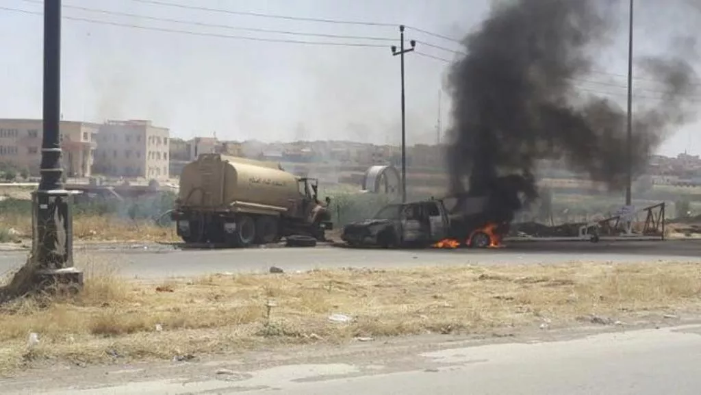 burning vehicles belonging to iraqi security forces are seen during clashes between iraqi security forces and al qaeda linked islamic state in iraq and the levant isil in the northern iraq city of mosul june 10 2014 photo reuters burning vehicles belonging to iraqi security forces are seen during clashes between iraqi security forces and al qaeda linked islamic state in iraq and the levant isil in the northern iraq city of mosul june 10 2014 photo reuters