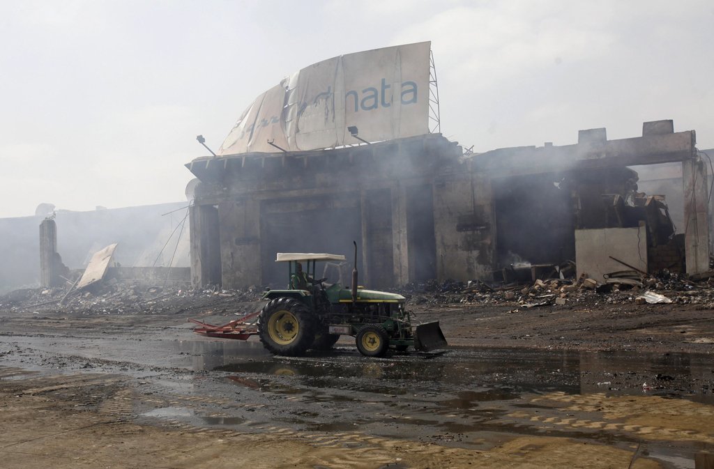 hundreds of thousands of mobile phones and tons of medicines chemicals pharmaceutical raw material fruits electronic devices and other goods were stored in the warehouse of gerry s dnata when the attack occurred photo reuters