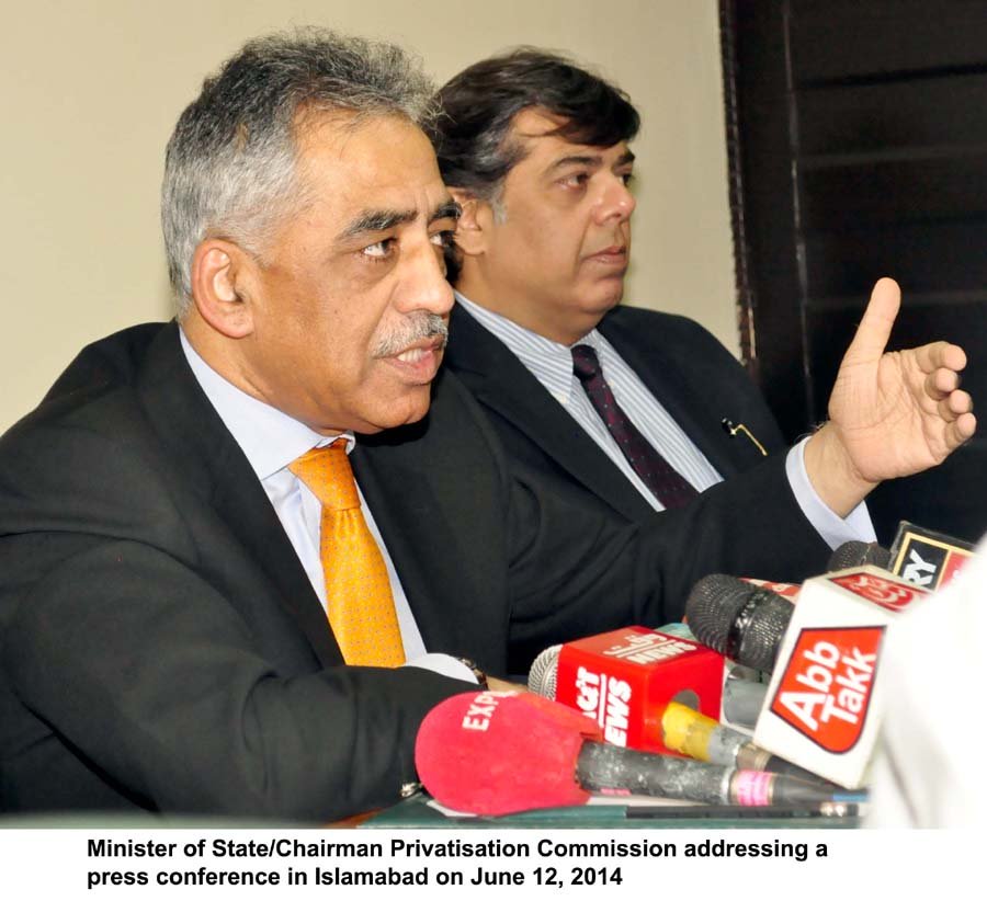 chairman privatisation commission muhammad zubair addressing a press conference in islamabad on june 12 2014 photo pid