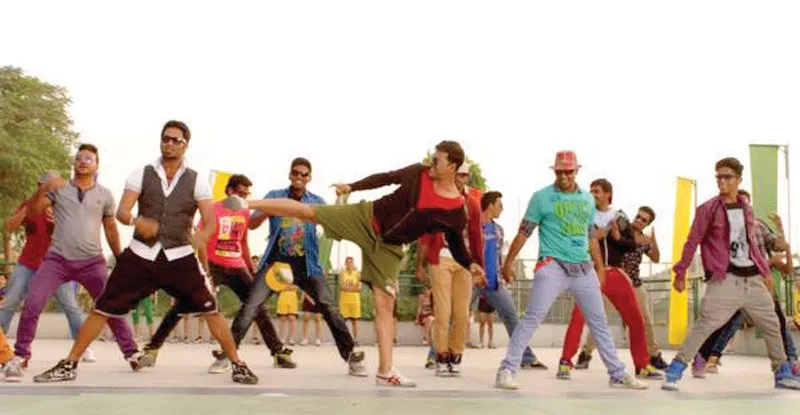the vibrant bermudas and sneakers combination doesn t complement kumar s rugged persona and sonakshi s way of carrying out the athletic scenes in the film is crude photos file the vibrant bermudas and sneakers combination doesn t complement kumar s rugged persona and sonakshi s way of carrying out the athletic scenes in the film is crude photos file