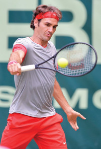 edgy federer victorious in halle