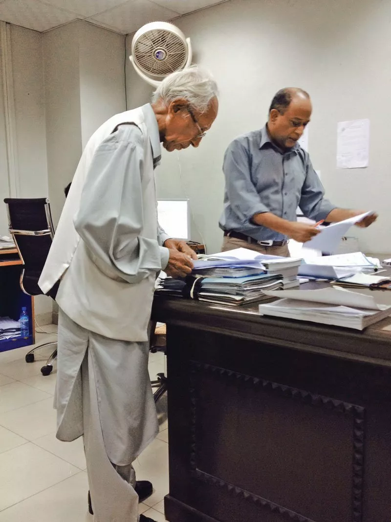 an 80 year old masood ahmed jafri pores over the next karachi city government budget with deputy director saghir ahmed on thursday at civic centre the 2014 2015 budget is likely to be announced in two weeks photo mahim maher express an 80 year old masood ahmed jafri pores over the next karachi city government budget with deputy director saghir ahmed on thursday at civic centre the 2014 2015 budget is likely to be announced in two weeks photo mahim maher express