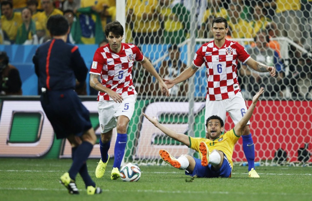 brazil 039 s forward fred front is fouled by croatia 039 s defender dejan lovren r to be awarded a penalty during a group a football match between brazil and croatia at the corinthians arena in sao paulo during the 2014 fifa world cup on june 12 2014 photo afp brazil 039 s forward fred front is fouled by croatia 039 s defender dejan lovren r to be awarded a penalty during a group a football match between brazil and croatia at the corinthians arena in sao paulo during the 2014 fifa world cup on june 12 2014 photo afp