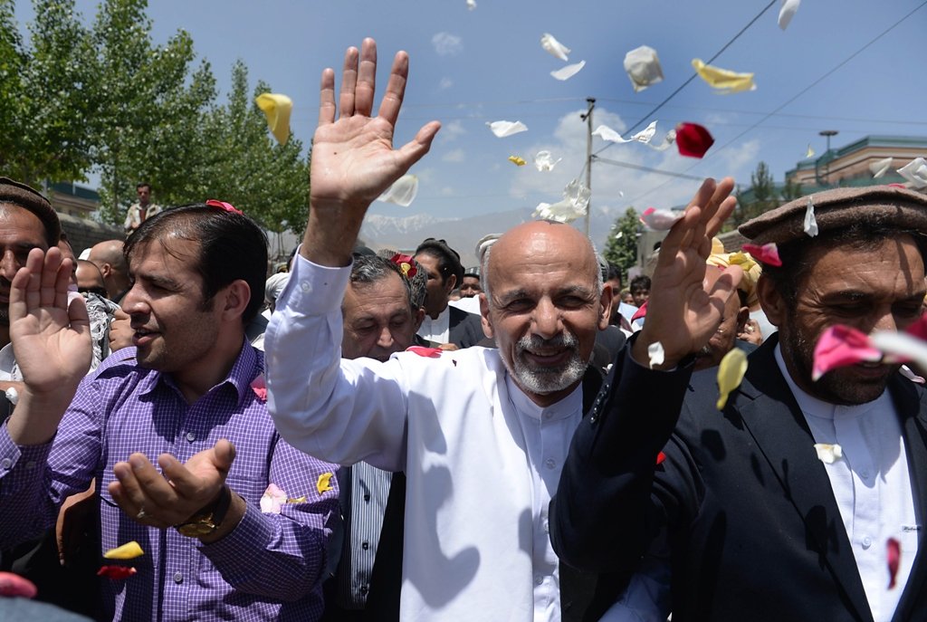 ghani says he would immediately form a small consortium of key donors outline economic reforms within 30 days photo afp