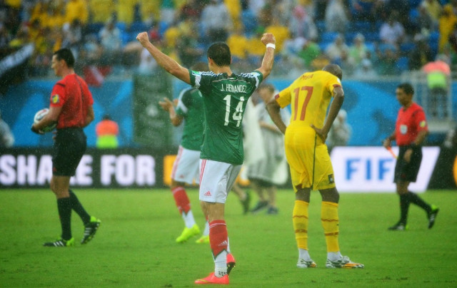 mexico 039 s forward javier hernandez celebrates at the end of the group a football match between mexico and cameroon at the dunas arena in natal during the 2014 fifa world cup on june 13 2014 mexico won 1 0 photo afp mexico 039 s forward javier hernandez celebrates at the end of the group a football match between mexico and cameroon at the dunas arena in natal during the 2014 fifa world cup on june 13 2014 mexico won 1 0 photo afp