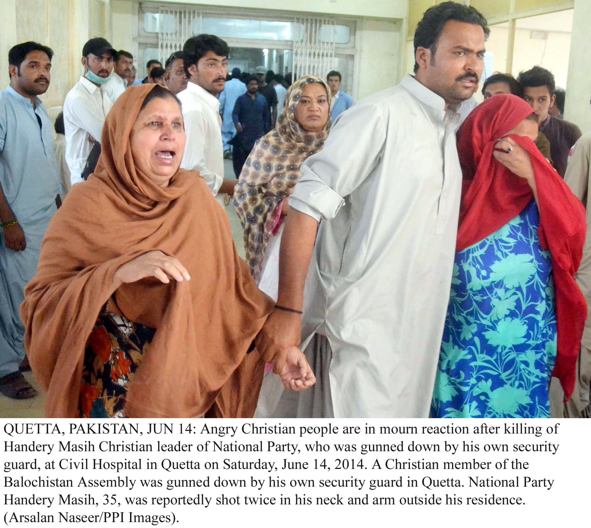 handery masieh 039 s relatives mourn his death at the civil hospital in quetta photo ppi