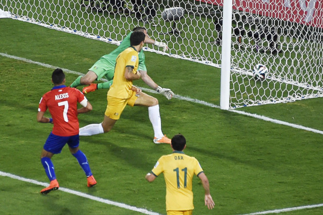 chile 039 s forward alexis sanchez l scores past australia 039 s goalkeeper mathew ryan during a group b football match between chile and australia at the pantanal arena in cuiaba during the 2014 fifa world cup on june 13 2014 photo afp chile 039 s forward alexis sanchez l scores past australia 039 s goalkeeper mathew ryan during a group b football match between chile and australia at the pantanal arena in cuiaba during the 2014 fifa world cup on june 13 2014 photo afp