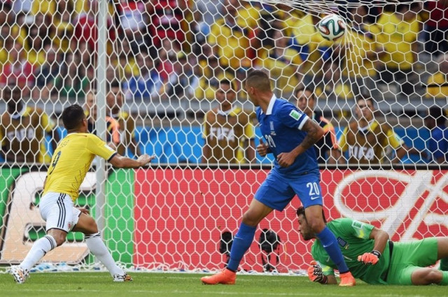 colombia 039 s midfielder james rodriguez c celebrates after scoring during a group c football match between colombia and greece at the mineirao arena in belo horizonte during the 2014 fifa world cup on june 14 2014 photo afp colombia 039 s midfielder james rodriguez c celebrates after scoring during a group c football match between colombia and greece at the mineirao arena in belo horizonte during the 2014 fifa world cup on june 14 2014 photo afp