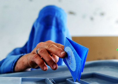 ignoring threats afghans vote in final test