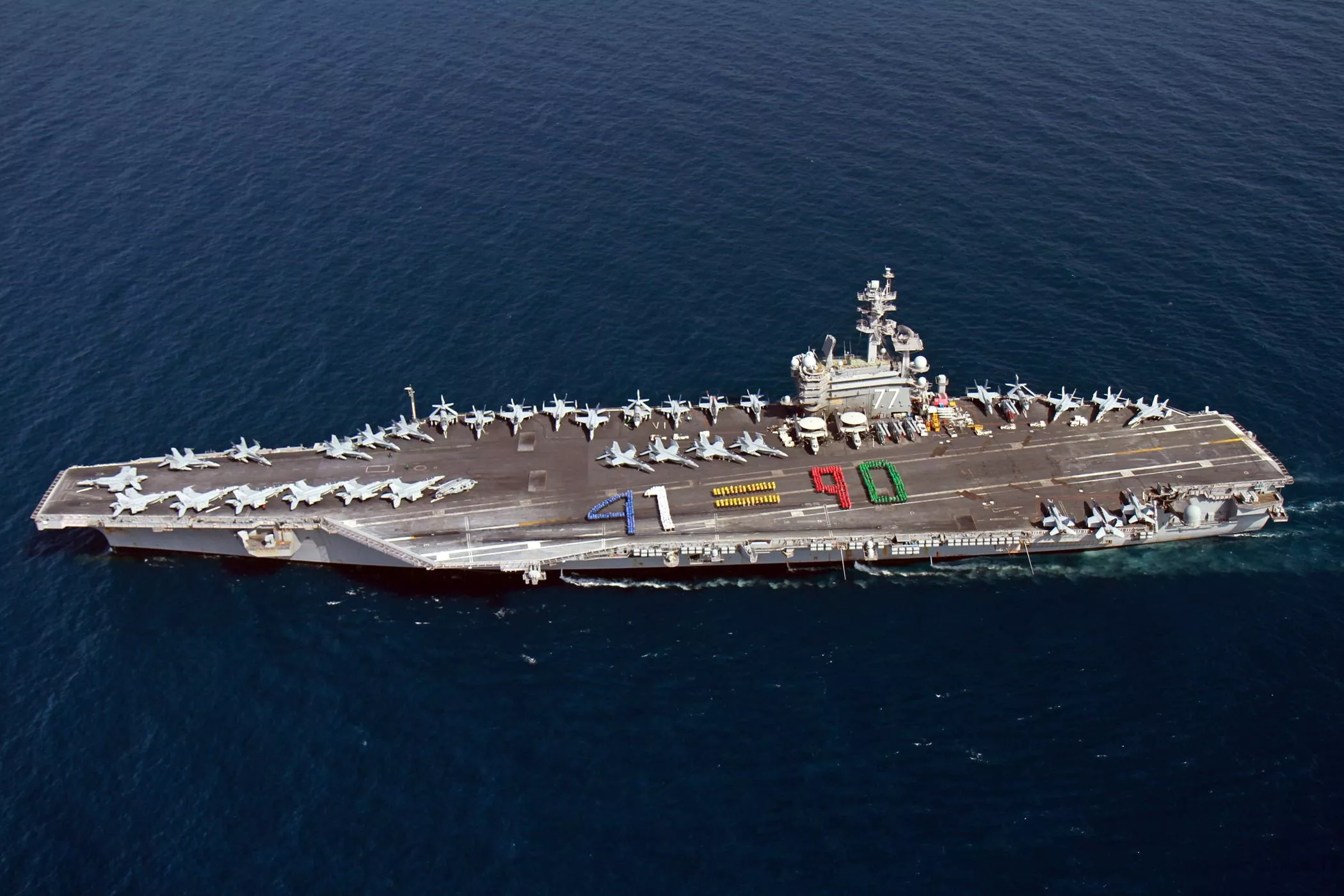 a handout picture released by the us navy shows aircraft carrier uss george h w bush cvn 77 sailing in the arabian sea on june 13 2014 photo afp a handout picture released by the us navy shows aircraft carrier uss george h w bush cvn 77 sailing in the arabian sea on june 13 2014 photo afp