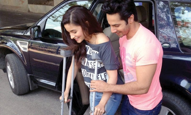 alia was spotted on crutches when she stepped out to take a metro ride with co star varun dhawan photo file alia was spotted on crutches when she stepped out to take a metro ride with co star varun dhawan photo file