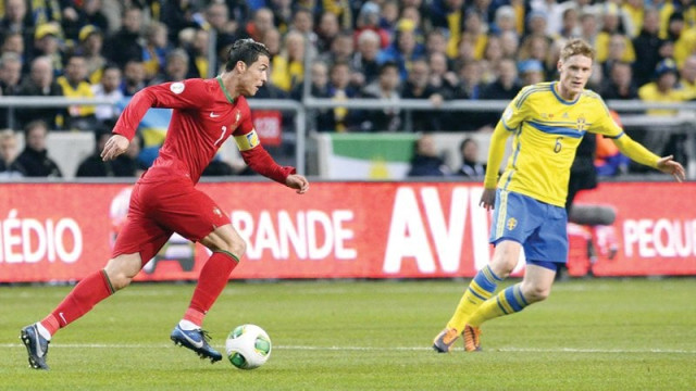 ronaldo will be looking to display some fancy footwork in order to lose the stubborn german defenders photo afp ronaldo will be looking to display some fancy footwork in order to lose the stubborn german defenders photo afp