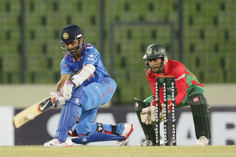 ajinkya rahane scored and important 93 ball 64 to bag the man of the match awards as india beat bangladesh in a rain curtailed first odi photo afp