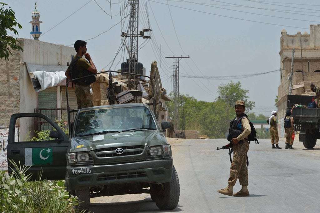 soldiers heading towards north waziristan are pictured by a road in bannu district on june 16 2014 photo afp