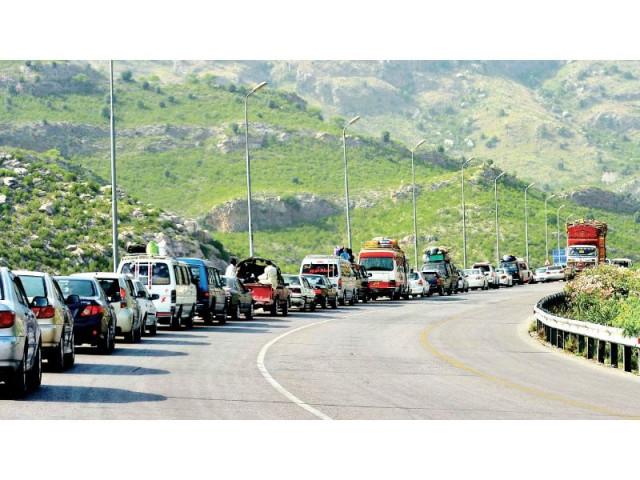 queues of cars and vans carrying tribesmen from north waziristan wait to clear darra adam khel check post photo afp queues of cars and vans carrying tribesmen from north waziristan wait to clear darra adam khel check post photo afp