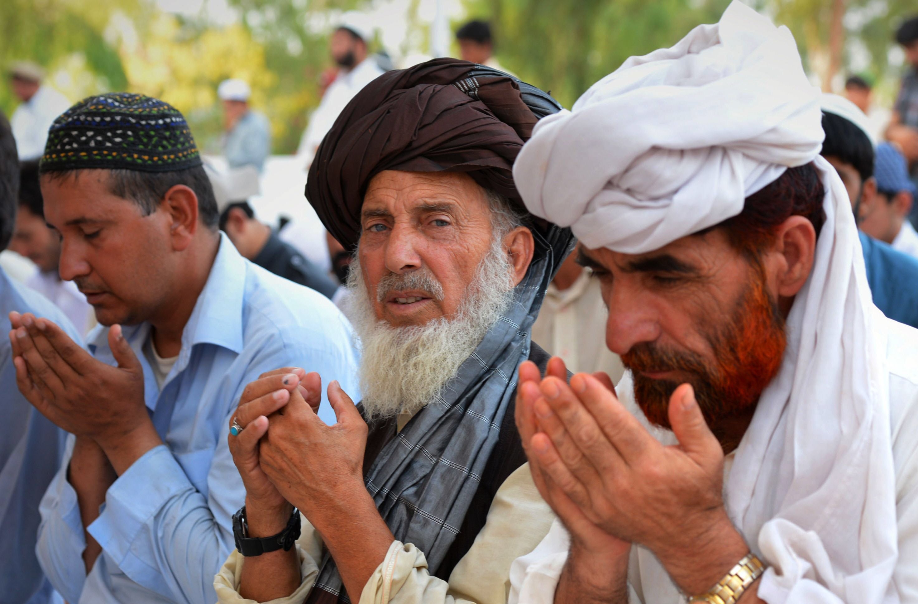 civilians offering prayers for their families while taking refuge photo reuters