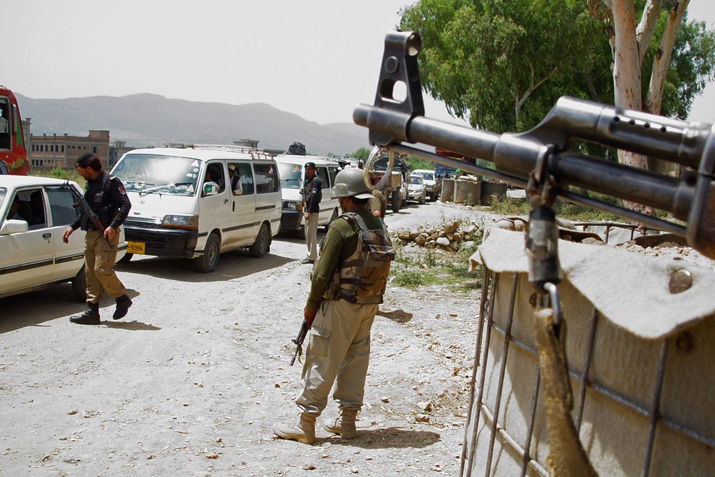 security personnel keep watch at a checkpoint in hangu on june 17 2014 photo afp