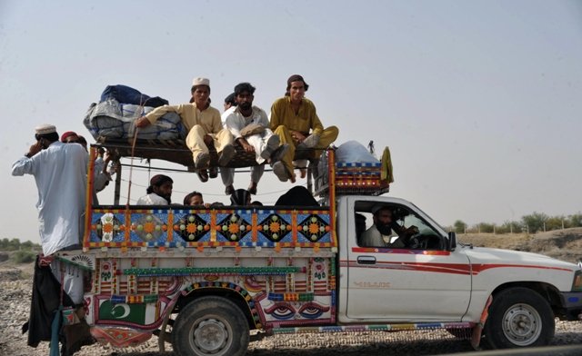 civilians fleeing from the military operation in north waziristan agency arrive in bakka khel in bannu district photo afp