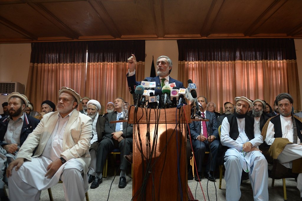 afghan presidential election candidate abdullah abdullah on june 18 demanded a halt to vote counting over fraud allegations raising the prospect of a political crisis as the country undergoes its first democratic transition of power photo afp