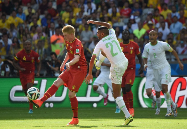 belgium 039 s midfielder kevin de bruyne l and algeria 039 s forward riyad mahrez c vie for the ball during a group h football match between belgium and algeria at the mineirao stadium in belo horizonte during the 2014 fifa world cup on june 17 2014 photo afp belgium 039 s midfielder kevin de bruyne l and algeria 039 s forward riyad mahrez c vie for the ball during a group h football match between belgium and algeria at the mineirao stadium in belo horizonte during the 2014 fifa world cup on june 17 2014 photo afp