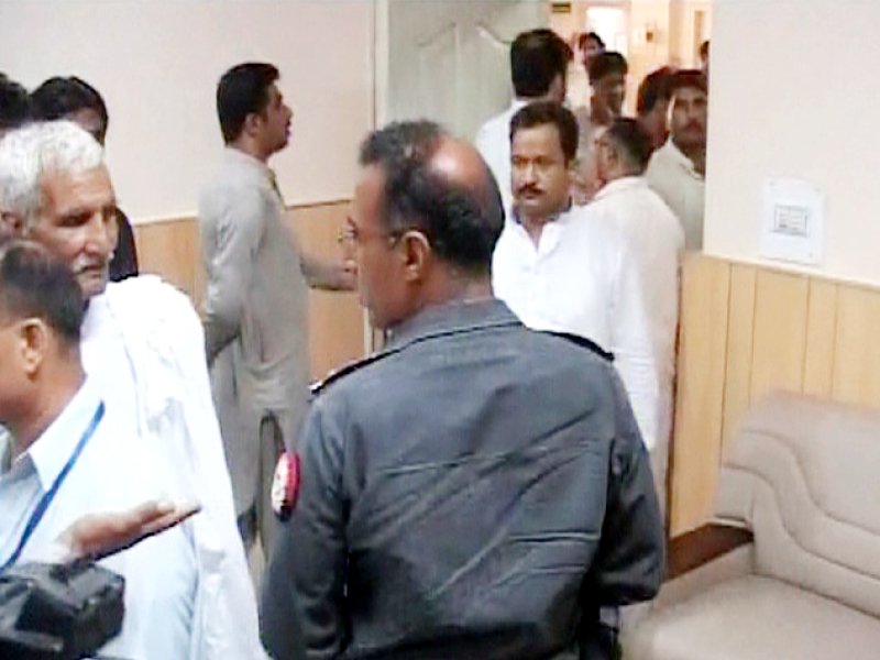 a video grab shows a police official inside the office of the ms of jinnah hospital photo express