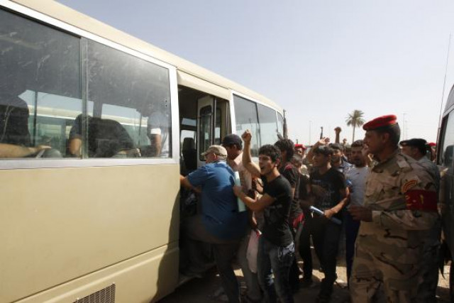 volunteers who have joined the iraqi army to fight against the predominantly sunni militants from isil who have taken over mosul and other northern provinces prepare to board a bus in baghdad photo reuters volunteers who have joined the iraqi army to fight against the predominantly sunni militants from isil who have taken over mosul and other northern provinces prepare to board a bus in baghdad photo reuters