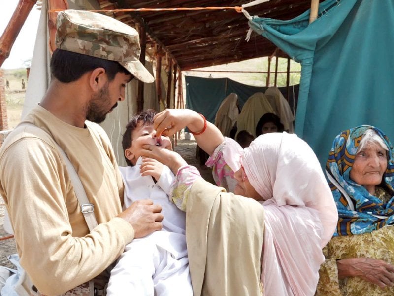 polio drops are administered to a child coming from north waziristan at q camp in bannu photo inp