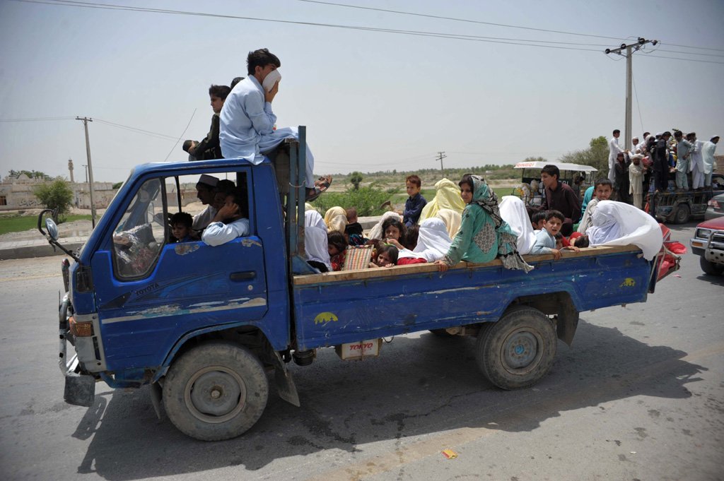 civilians fleeing from the operation in north waziristan photo afp