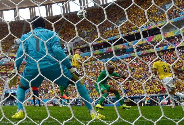 ivory coast 039 s goalkeeper boubacar barry fails to stop a goal by colombia 039 s midfielder james rodriguez c during a group c football match between colombia and ivory coast at the mane garrincha national stadium in brasilia during the 2014 fifa world cup on june 19 2014 photo afp ivory coast 039 s goalkeeper boubacar barry fails to stop a goal by colombia 039 s midfielder james rodriguez c during a group c football match between colombia and ivory coast at the mane garrincha national stadium in brasilia during the 2014 fifa world cup on june 19 2014 photo afp