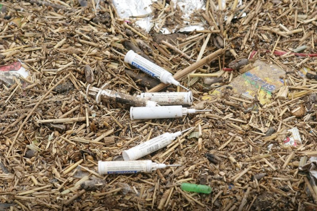 syringes used for the cattle in bhains colony is dumped into the nullah that eventually makes its way into the open sea at rehri goth the residents have suffered several piercing and take more than two months to recover photo athar khan express syringes used for the cattle in bhains colony is dumped into the nullah that eventually makes its way into the open sea at rehri goth the residents have suffered several piercing and take more than two months to recover photo athar khan express