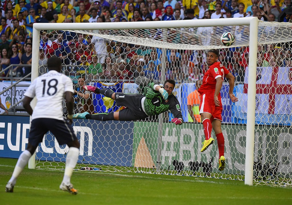 switzerland 039 s goalkeeper diego benaglio fails to stop a ball shot by france 039 s forward olivier giroud during a group e football match between switzerland and france at the fonte nova arena in salvador during the 2014 fifa world cup on june 20 2014 photo afp