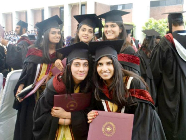 students pose for a picture in their convocation gowns photo maham hameed students pose for a picture in their convocation gowns photo maham hameed