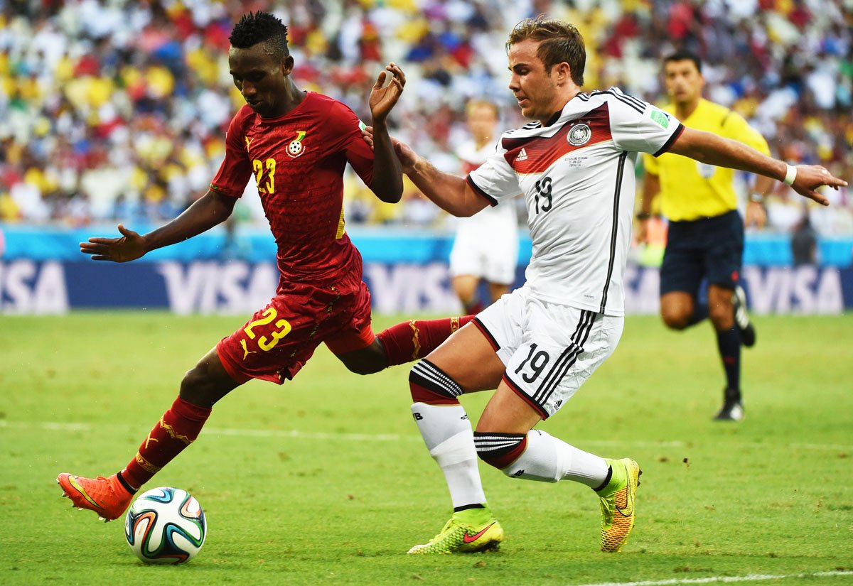 ghana 039 s defender harrison afful l vies with germany 039 s forward mario goetze during a group g football match between germany and ghana at the castelao stadium in fortaleza during the 2014 fifa world cup on june 21 2014 photo afp