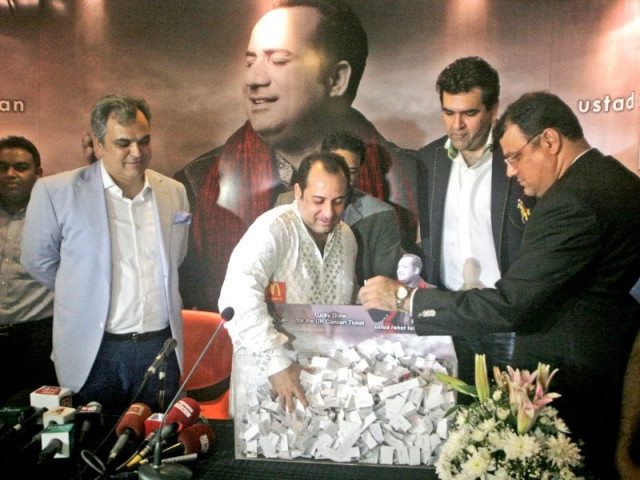 rahat fateh ali draws the name of the person who will accompany him on his uk tour this year photo athar khan express rahat fateh ali draws the name of the person who will accompany him on his uk tour this year photo athar khan express