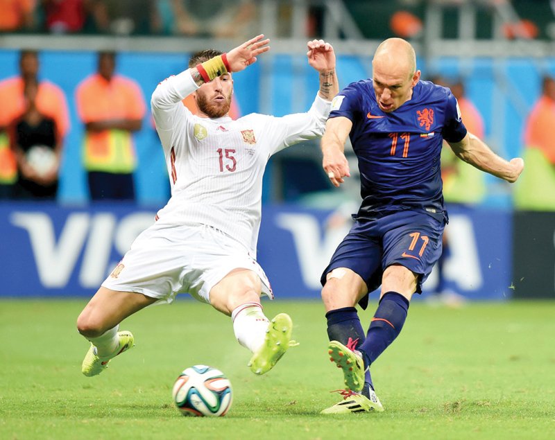 netherlands and chile will vie for the top spot in group b to avoid a clash with the hosts however the anomalous placing of brazil in group a might cause a change in plan photo afp