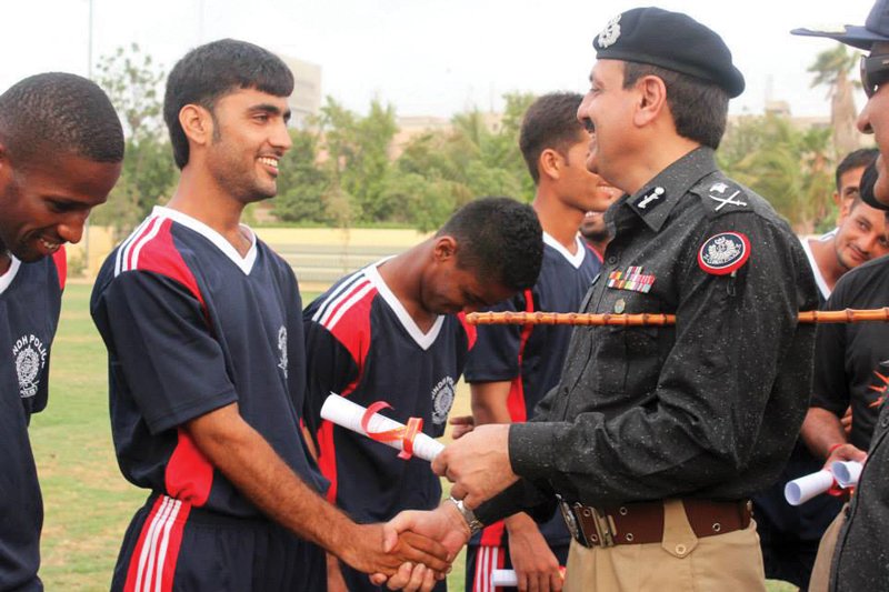 karachi police chief aigp ghulam qadir thebo hands out appointment letters to the newly inducted players of the sindh police football team photo courtesy karachi police media cell