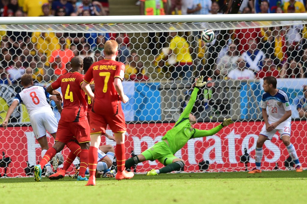 russia 039 s goalkeeper igor akinfeev 2r fails to stop a shot from an obscured belgium 039 s forward divock origi to score a goal during the group h football match between belgium and russia at the maracana stadium in rio de janeiro on june 22 2014 during the 2014 fifa world cup photo afp