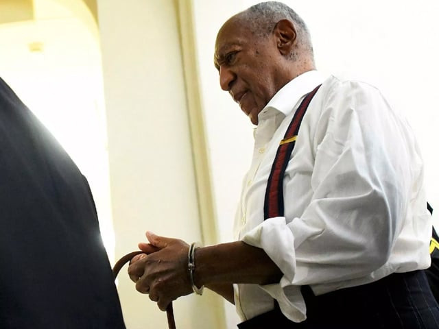 bill cosby is led away in handcuffs after being sentenced to three to 10 years in his sexual assault retrial on september 25 2018 photo getty bill cosby is led away in handcuffs after being sentenced to three to 10 years in his sexual assault retrial on september 25 2018 photo getty