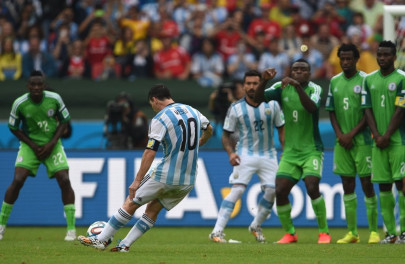 messi double ensures argentina top group nigeria also through