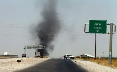 iraq forces press fight for tikrit university officers