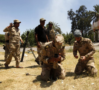 iraq troops advance on tikrit in biggest fight back yet