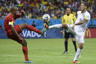 belgium overcome american resistance to reach quarters