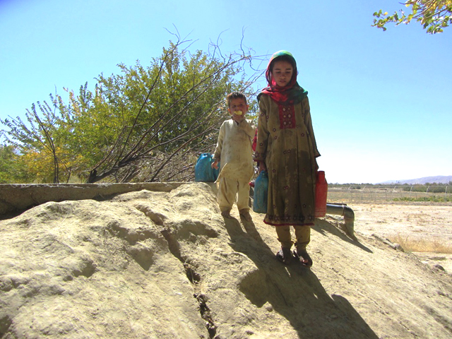 local children fetching drinking water from the karez photo rina saeed khan